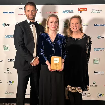 Colin, Aniwue and Elizabeth with award 